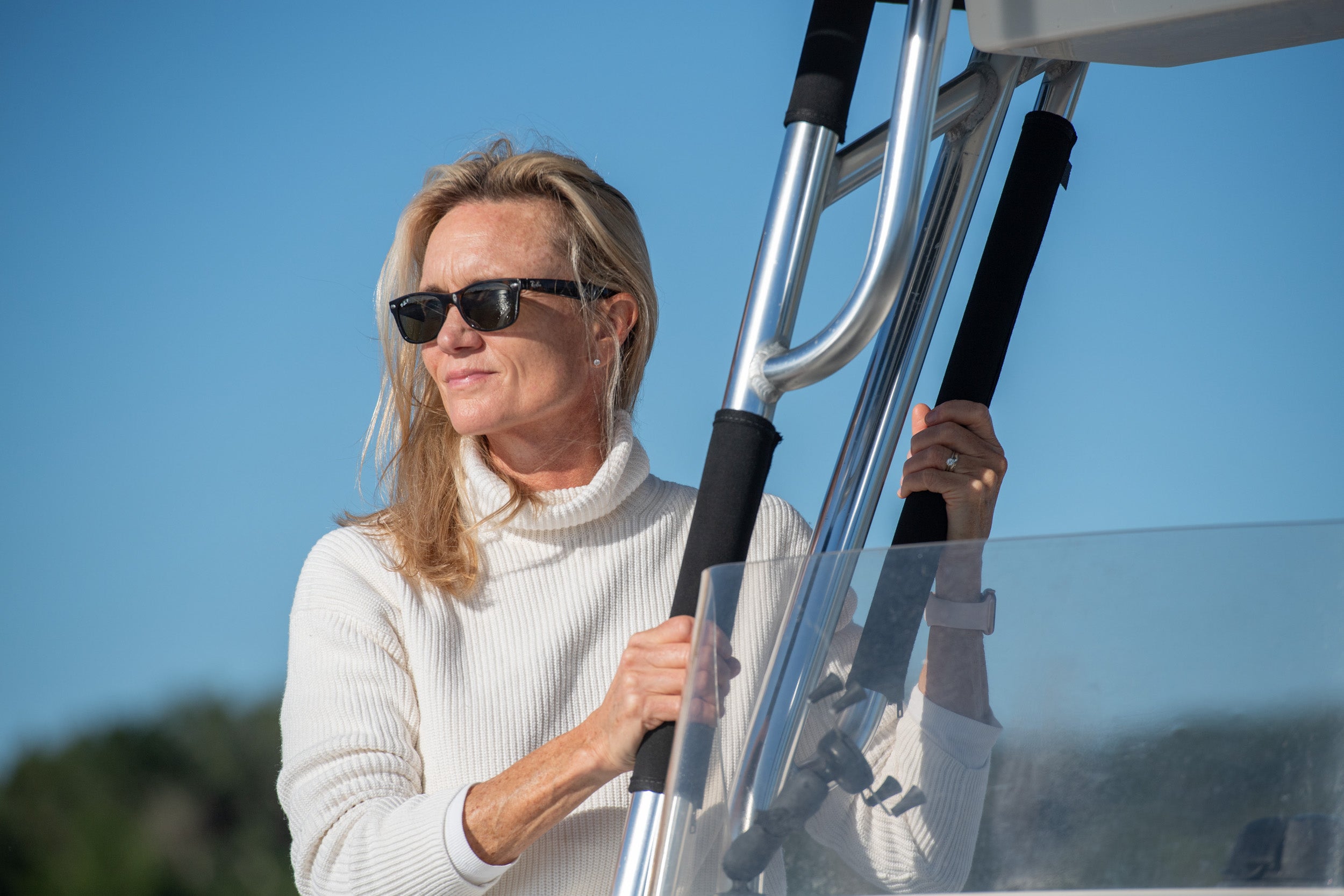 Woman Cruising on a Boat Holding Safety Grip Marine Boat